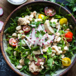 A simple recipe for Tuscan White Bean & Tuna Salad with arugula, radishes, tomatoes and a simple balsamic vinaigrette. #tunasalad #whitebeans #tunarecipes #salad #healthysalad #tuscansalad