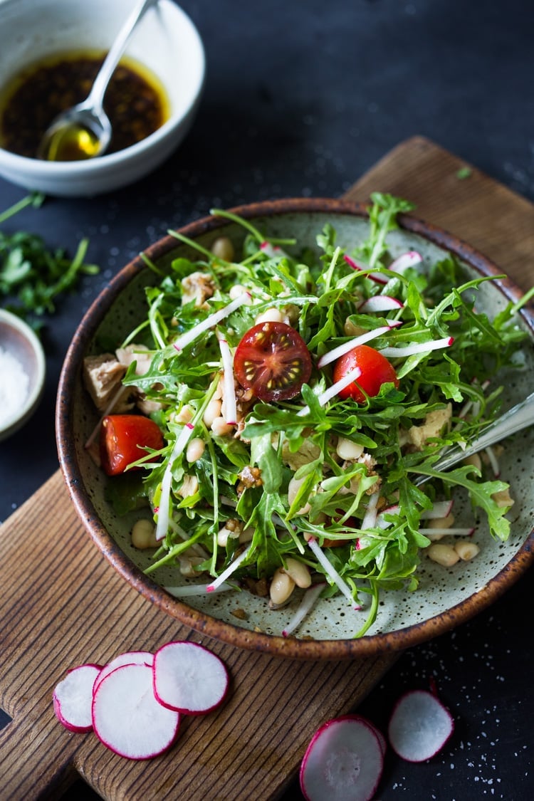 Tuscan Tuna Salad with arugula, white beans, radishes, tomatoes and a simple vinaigrette. Fast and easy, make this in 15 minutes!