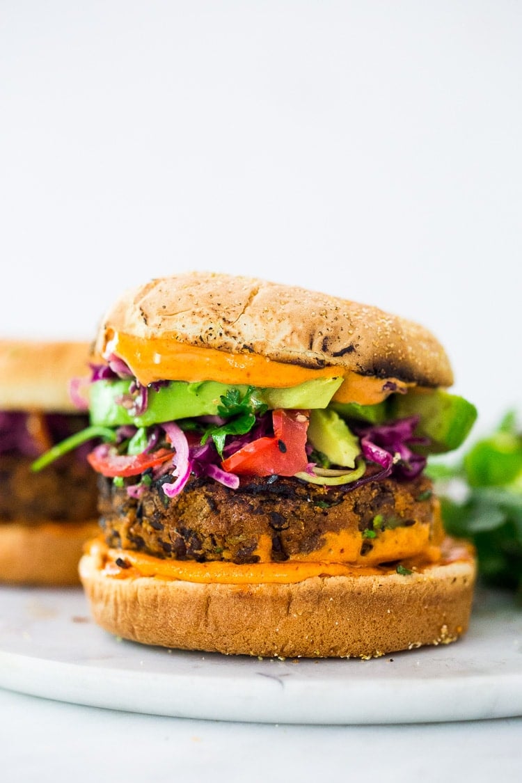 a vegetarian black bean burger with bun.