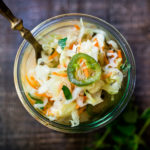 Curtido - A cultured Salvadorian Slaw with cabbage, carrots, onion and oregano. Simple to make, full of healthy probiotics! Use on Tacos, Pupusas, quesadillas or enchiladas as a delicious healthy condiment! #Curtido #fermented #slaw #cultured #kraut