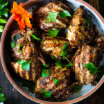 Grilled Moroccan Chicken with Ras El Hanout, garlic and lemon - a simple healthy recipe, using skinless chicken thighs, bursting with North African flavor! Delicious, fast and easy! #moroccanchicken #raselhanout #moroccanfood #moroccan