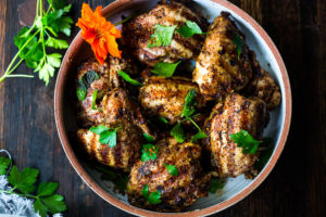 Grilled Moroccan Chicken with Ras El Hanout, garlic and lemon - a simple healthy recipe, using skinless chicken thighs, bursting with North African flavor! Delicious, fast and easy! #moroccanchicken #raselhanout #moroccanfood #moroccan