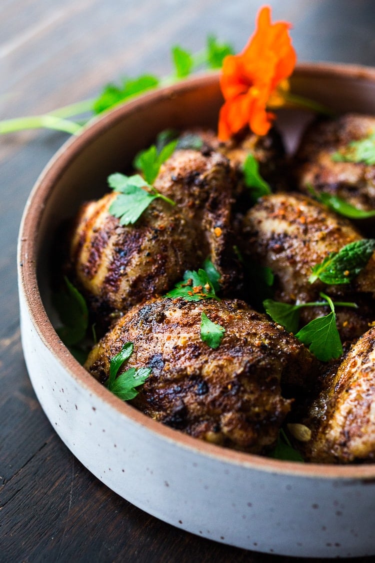 Moroccan Chicken with Ras El Hanout, garlic and lemon - a simple healthy recipe, using skinless chicken thighs, bursting with North African flavor! Delicious, fast and easy! #moroccanchicken #raselhanout #moroccanfood #moroccan