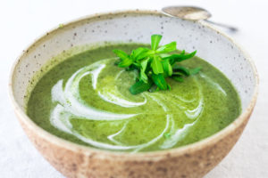 Vibrant, luscious Nettle Soup with Tarragon - a simple easy recipe, full of incredible health benefits and lovely flavor. A Scandinavian specialty to be enjoyed in late spring and early summer when nettles are aplenty. Vegan Adaptable! #nettles #nettlesoup #nettlesouprecipe #vegan #tarragon #healthysoup #springsoup #stingingnettle