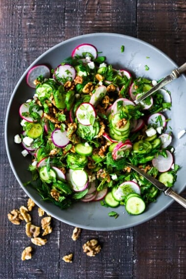 Persian Walnut Salad with Cucumbers, Radishes, Mint, Dill, Cilantro and Parsley. Loaded up with fresh herbs this refreshing summer salad is the perfect side to summer grilling! #walnuts #cawalnuts #walnutsalad #persiansalad #herbsalad #persianherbsalad