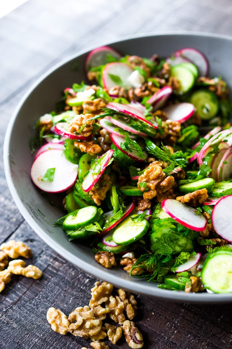 Persian Walnut Salad with Cucumbers, Radishes, Mint, Dill, Cilantro and Parsley. Loaded up with fresh herbs this refreshing summer salad is the perfect side to summer grilling! #walnuts #cawalnuts #walnutsalad #persiansalad #herbsalad #persianherbsalad