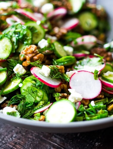Persian Walnut Salad with Cucumbers, Radishes, Mint, Dill, Cilantro and Parsley. Loaded up with fresh herbs this refreshing summer salad is the perfect side to summer grilling! #walnuts #cawalnuts #walnutsalad #persiansalad #herbsalad #persianherbsalad