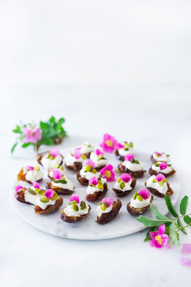 Stuffed Dates with Wild Rose Petals and Pistachios- a simple decadent appetizer or light dessert. #stuffeddates #dates #rosepetals #daterecipes #wildroses #rose #recipes 