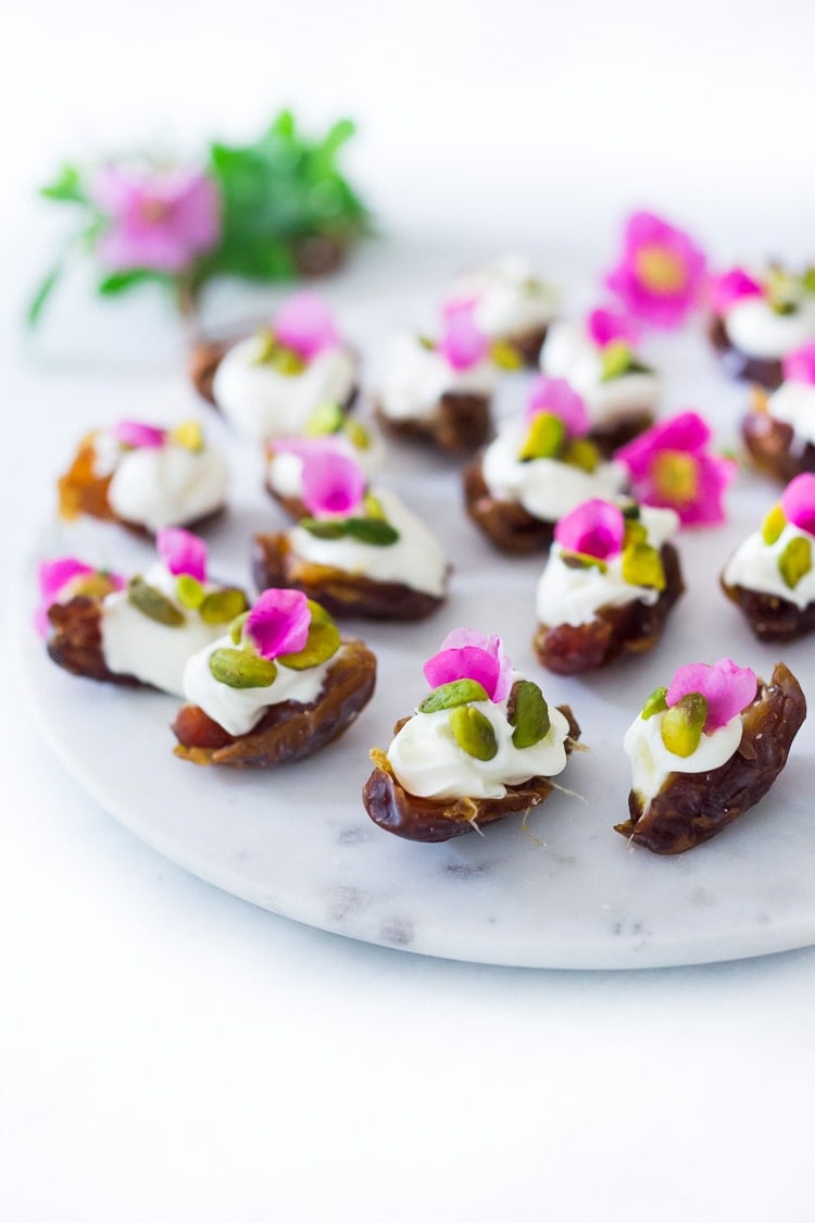 Stuffed Dates with Wild Rose Petals and Pistachios- a simple decadent appetizer or light dessert. #stuffeddates #dates #rosepetals #daterecipes #wildroses #rose #recipes 