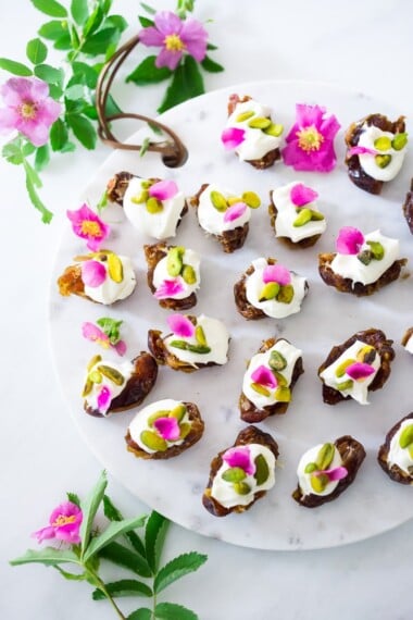 Stuffed Dates with Wild Rose Petals and Pistachios- a simple decadent appetizer or light dessert. #stuffeddates #dates #rosepetals #daterecipes #wildroses #rose #recipes