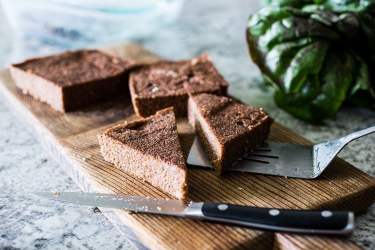 Crispy Teff Cakes with Wilted Chard and fresh Tomato Relish - a simple delicious vegan meal that is full of protein and nutrients! #teff #teffrecipes #teffcakes 