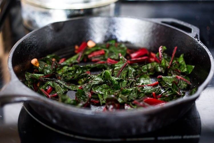 Crispy Teff Cakes with Wilted Chard and fresh Tomato Relish - a simple delicious vegan meal that is full of protein and nutrients! #teff #teffrecipes #teffcakes