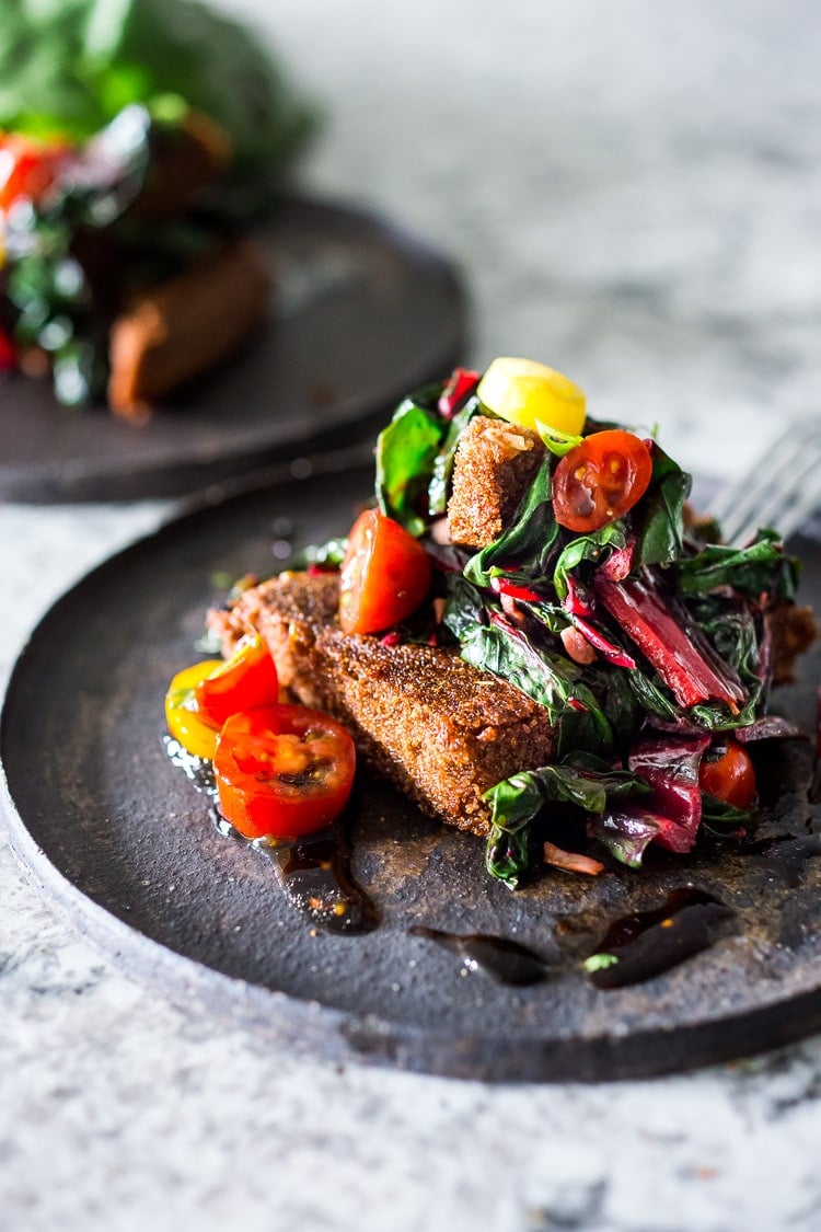 Savory Teff Cakes with Wilted Chard and fresh Tomato Relish - a simple delicious vegan meal that is full of protein and nutrients! #teff #teffrecipes #teffcakes