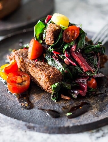 Crispy Teff Cakes with Wilted Chard and fresh Tomato Relish - a simple delicious vegan meal that is full of protein and nutrients! #teff #teffrecipes #teffcakes