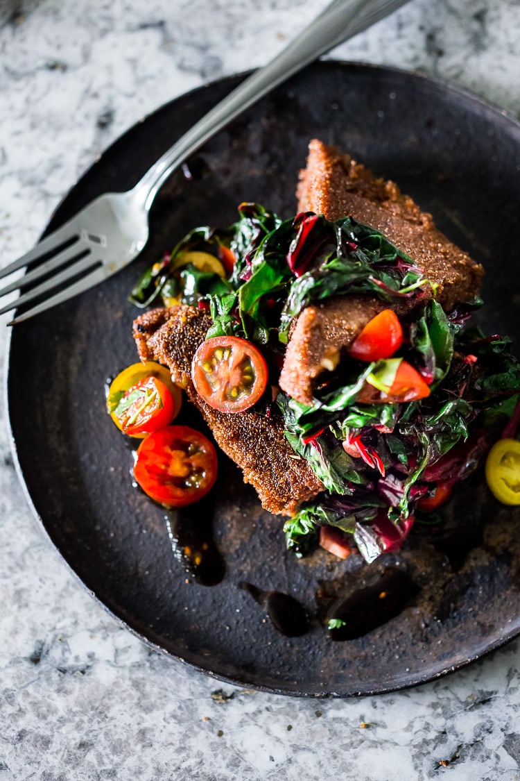 Vegan Teff Cakes with Wilted Chard and fresh Tomato Relish - a simple delicious vegan meal that is full of protein and nutrients! #teff #teffrecipes #teffcakes 