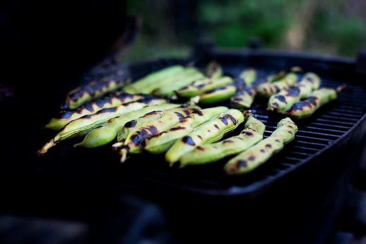 Grilled Fava Beans- with Mint, Lemon & Sumac, a simple, easy way to prepare fresh fava beans on the grill with Middle Eastern flavors. #fava #favabeans #grilled #favabeanrecipes