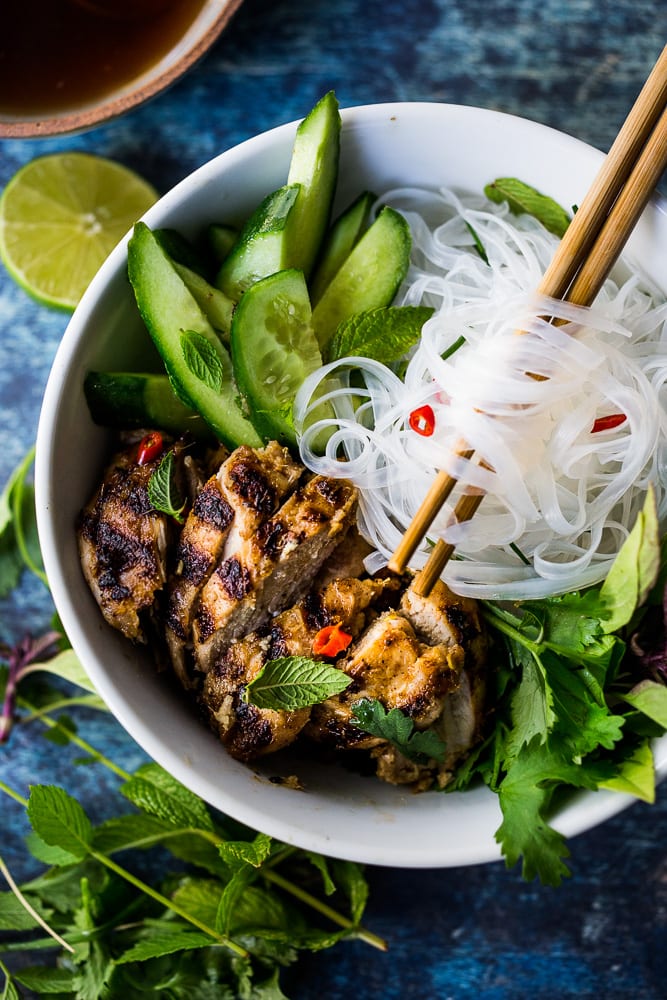 Grilled Lemongrass Chicken- bursting with Vietnamese flavors . Use this in Vietnamese Rice Noodle bowls ( Bun Ga Nuong )or own its own. Amazing flavor! #lemongrasschicken #vietnamesechicken #grilledchicken #lemongrass #lemongrassmarinade #vietnamesenoodlebowl 