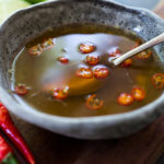 A simple authentic recipe for Nouc Cham, the Vietnamese dressing and dipping sauce for salads, spring rolls and noodle bowls. #nouccham #dressing #sauce #vietnamesesauce #dippingsauce