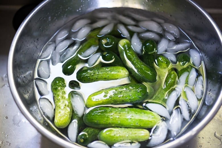 soaking the cucumbers in ice water. 