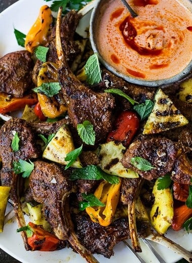 Grilled Lamb Chops with Harissa Yogurt and summer veggies- a simple easy meal, perfect for entertaining! #lamb #lambchops #grilledlamb #grilledlambchops