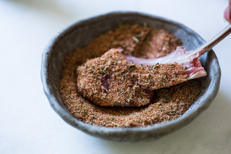 Harissa Grilled Lamb Chops with Harissa Yogurt and summer veggies- a simple easy meal, perfect for entertaining! #lamb #lambchops #grilledlamb #grilledlambchops
