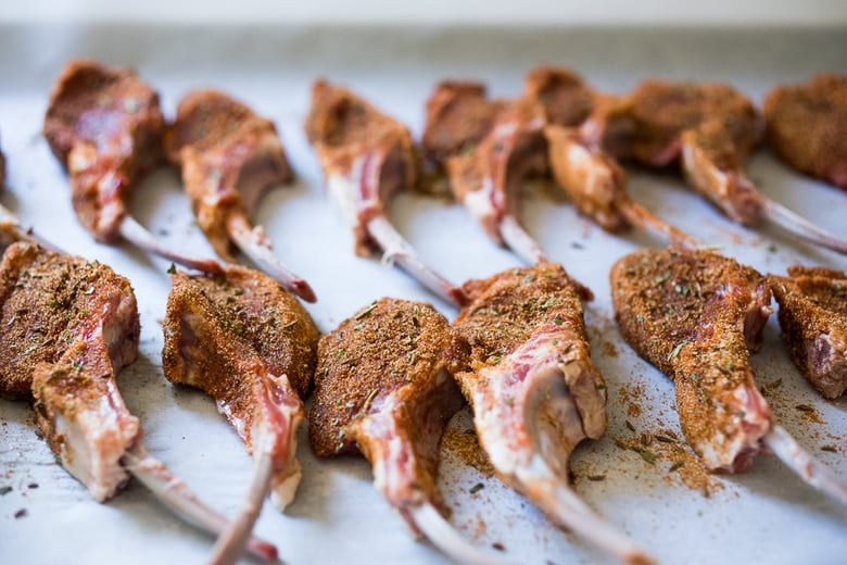 Harissa Grilled Lamb Chops with Harissa Yogurt and summer veggies- a simple easy meal, perfect for entertaining! #lamb #lambchops #grilledlamb #grilledlambchops