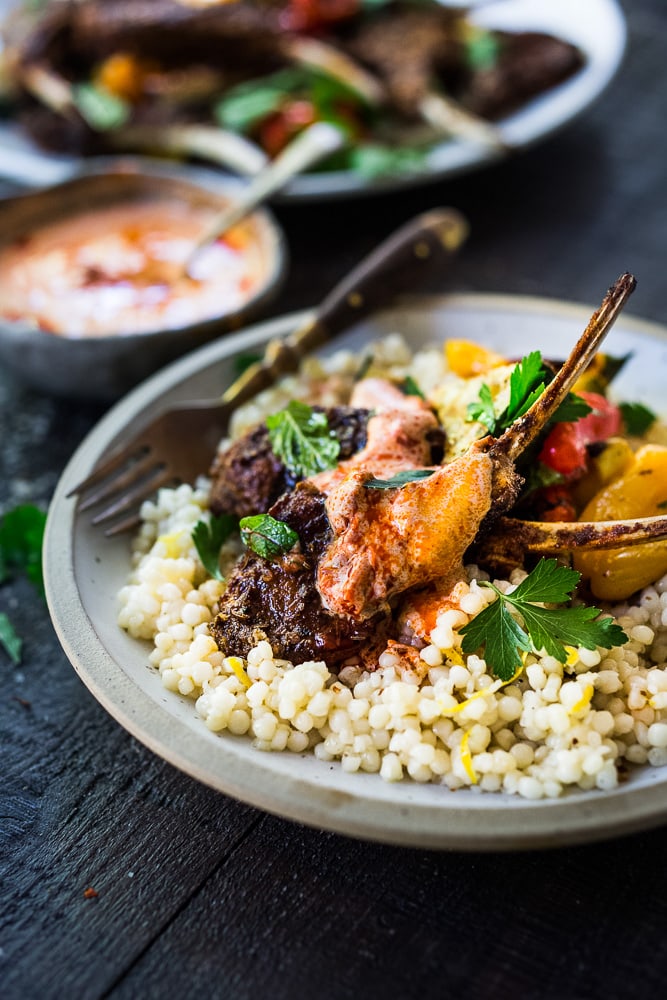 Harissa Grilled Lamb Chops with Harissa Yogurt and summer veggies- a simple easy meal, perfect for entertaining! #lamb #lambchops #grilledlamb #grilledlambchops