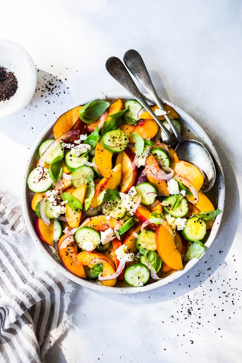 Nectarine Salad with cucumber, Basil, Goats Cheese, Red onion and optional Urfa Biber ( Turkish Chili Pepper). A simple delicious Farmers Market Salad you can put together in minutes! #nectarinesalad #nectarines #nectarinerecipes #farmersmarket #healthysalad #easysalads #cucumbersalad
