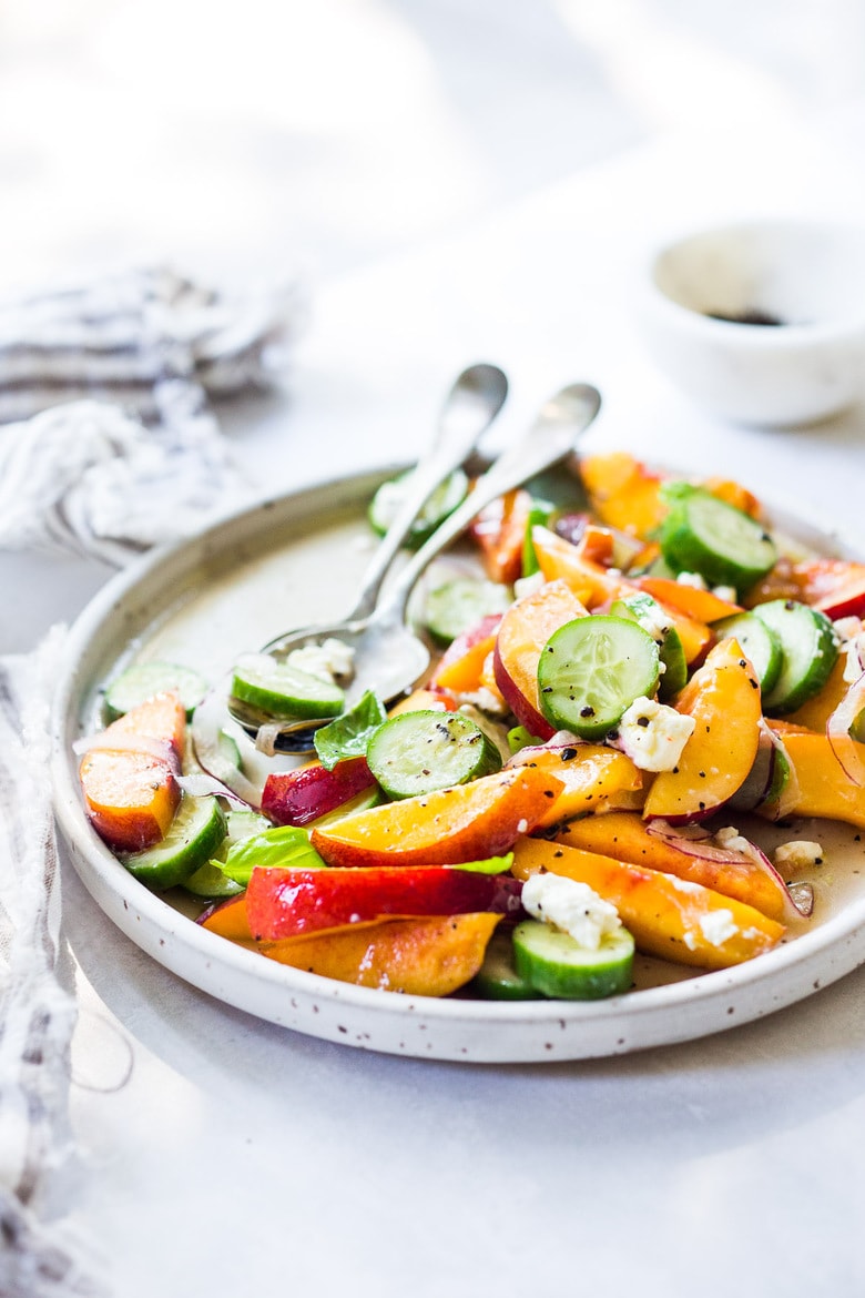 Nectarine Salad with cucumber, Basil, Goats Cheese, Red onion and optional Urfa Biber ( Turkish Chili Pepper). A simple delicious Farmers Market Salad you can put together in minutes! #nectarinesalad #nectarines #nectarinerecipes #farmersmarket #healthysalad #easysalads #cucumbersalad