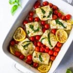 Simple Baked Cod with Tomatoes, Basil, Garlic Lemon- a fast and easy weeknight dinner that is healthy and delicious! #bakedcod #bakedfish #keto #keporecipes #weeknightdinner #weeknightdinners #easyfishrecipes