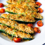 Baked Zucchini with Garlicky Parmesan Bread Crumbs- a simple easy vegetarian side dish that is baked in the oven. | #zucchinirecipes #bakedzucchini #vegetarian #sidedish #healhysidedish