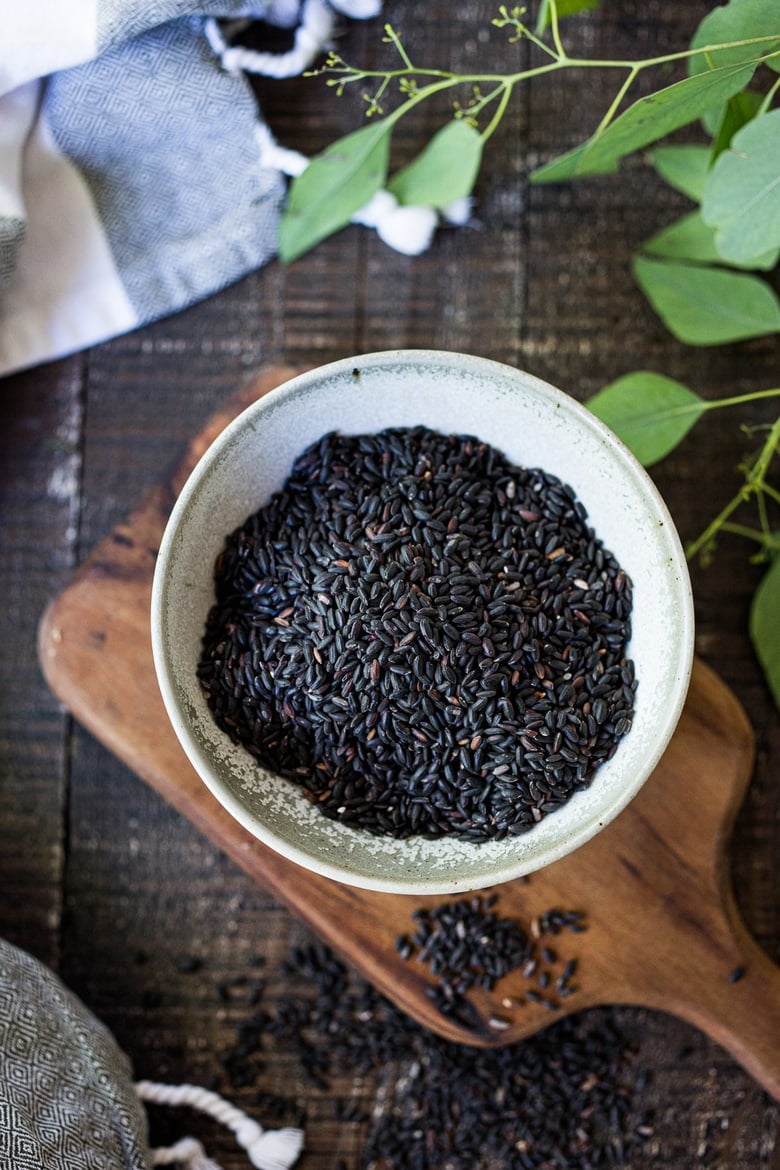 Why we ALL should be eating Forbidden Black Rice! Plus 3 healthy ways to cook black rice- stovetop, Instant Pot & Pilaf! A healthy vegan gluten-free side dish full of powerful health benefits. The most nutritious rice you can find! #blackrice #forbiddenblackrice #howtocookblackrice #vegansides #healthysides #antioxidant #cleaneating #eatclean