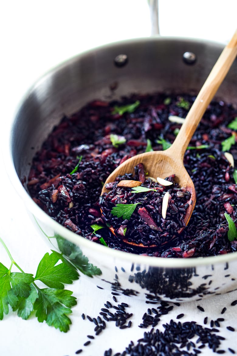 Why we ALL should be eating Forbidden Black Rice! Plus 3 healthy ways to cook black rice- stovetop, Instant Pot & Pilaf! A healthy vegan gluten-free side dish full of powerful health benefits. The most nutritious rice you can find! #blackrice #forbiddenblackrice #howtocookblackrice #vegansides #healthysides #antioxidant #cleaneating #eatclean