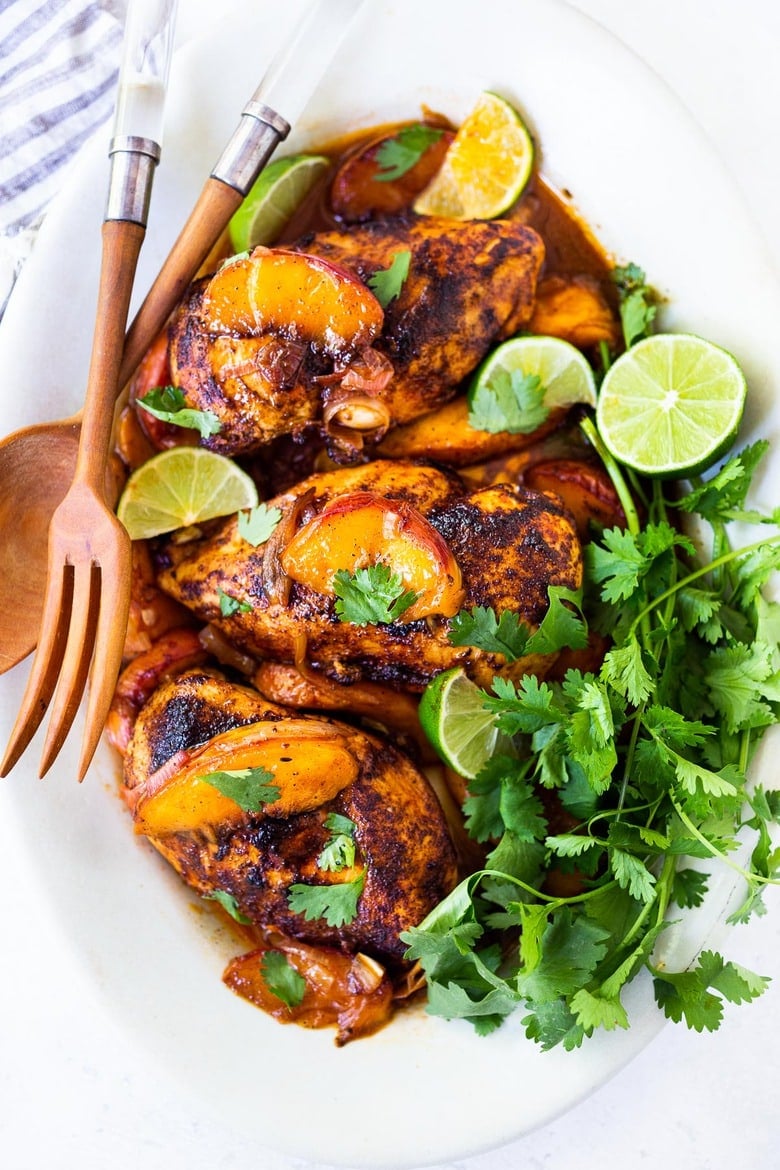 Chili Lime Chicken with Glazed Peaches - a fast and healthy weeknight dinner highlighting fresh juicy peaches. Can be made with breast or thigh meat. #chicken #chickenrecipes #peaches #easydinner #chililimechicken #weeknightdinner #easydinner