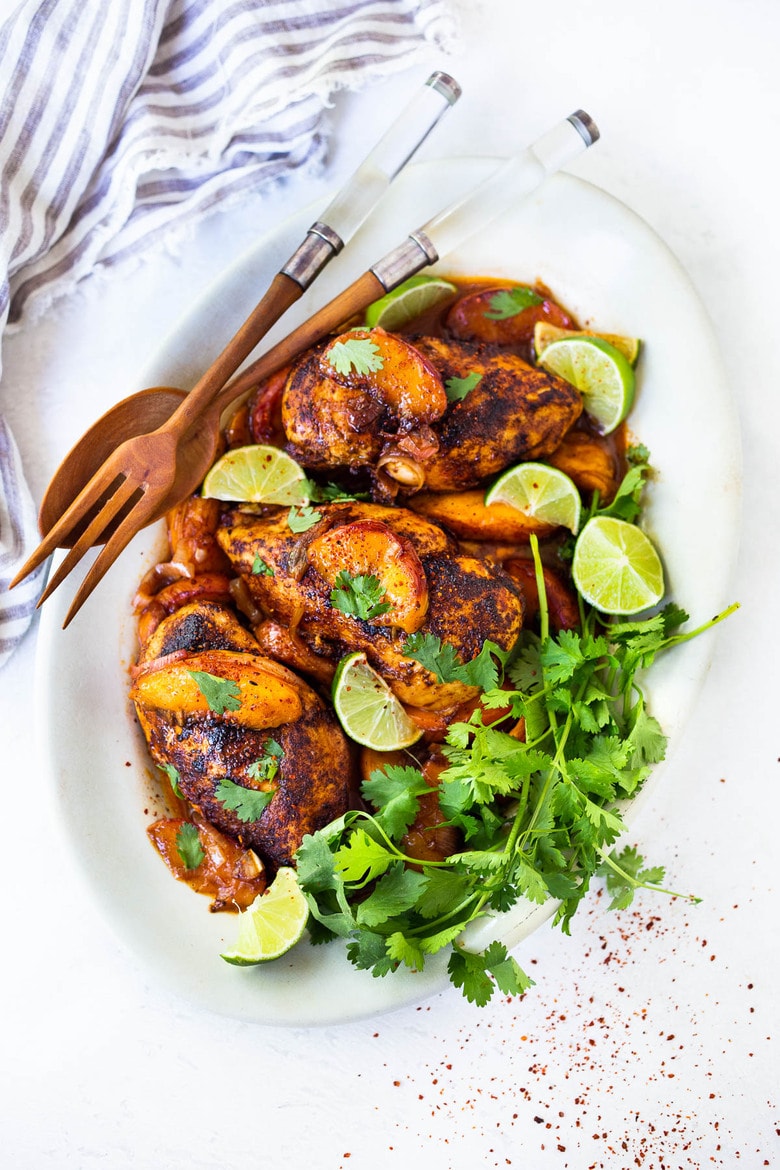 Chili Lime Chicken with Glazed Peaches - a fast and healthy weeknight dinner highlighting fresh juicy peaches. Can be made with breast or thigh meat. #chicken #chickenrecipes #peaches #easydinner #chililimechicken #weeknightdinner #easydinner 