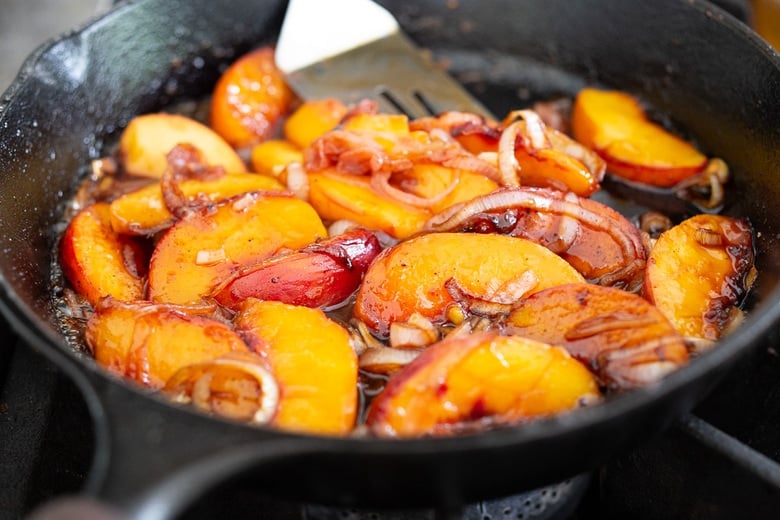 Chili Lime Chicken with Glazed Peaches - a fast and easy weeknight dinner highlighting fresh juicy peaches. Can be made with breast or thigh meat. #chicken #chickenrecipes #peaches #easydinner #chililimechicken #weeknightdinner #easydinner #bakedchicken 