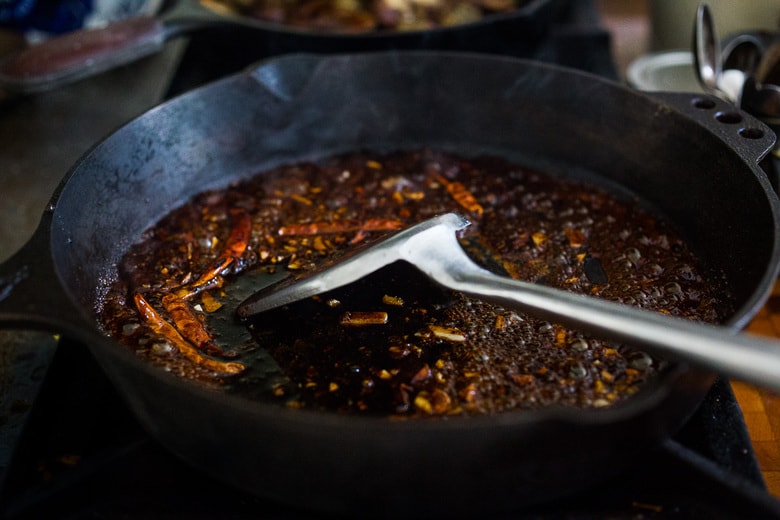 Stir-fried Chinese eggplant recipe with Szechuan sauce, chilies and peanuts 