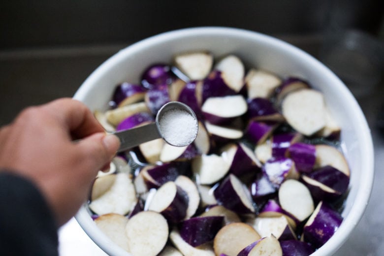 Salting Chinese eggplant. 