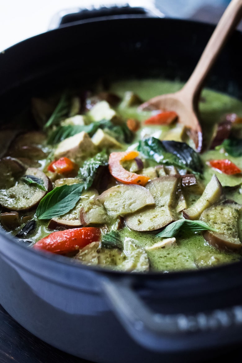 An easy authentic recipe for Thai Green Curry with eggplant and your choice of tofu, chicken or shrimp.  A fast and easy weeknight dinner that can be made in 30 minutes!  Use store-bought green curry paste or make your own homemade green curry paste.