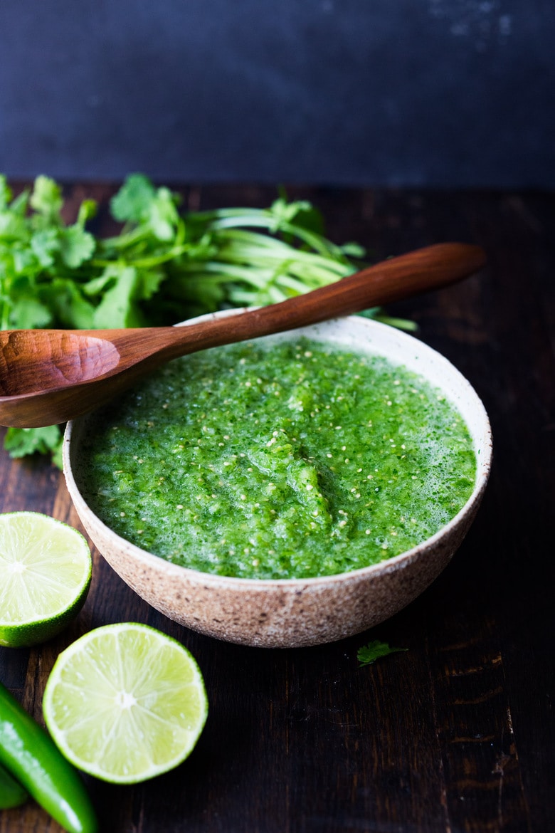 50 MUST-TRY FARMERS MARKET RECIPES! Like this Fresh Tomatillo Salsa! (aka Salsa Verde) A FRESH vibrant recipe for Tomatillo Salsa using *uncooked* tomatillos, resulting in the most amazing flavors. Serve this with chips, Baja Tacos, quesadillas or as a sauce for enchiladas! #tomatillosalsa #tacosalsa #salsaverde #tomatillo #bajatacos #salsa #verde #greensalsa