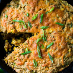 Zucchini Cornbread! A savory zucchini bread infused with Mexican spices, cornmeal, fresh corn and sharp cheddar cheese, baked in a skillet. A cozy side to stew, soup and chili.