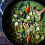 An easy authentic recipe for Thai Green Curry with eggplant and your choice of tofu, chicken or shrimp. A fast and easy weeknight dinner that can be made in 30 minutes! Use store-bought green curry paste or make your own homemade green curry paste.