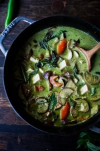 An easy authentic recipe for Thai Green Curry with eggplant and your choice of tofu, chicken or shrimp.  A fast and easy weeknight dinner that can be made in 30 minutes!  Use store-bought green curry paste or make your own homemade green curry paste.