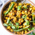 Flavorful Aloo Gobi! Indian-Spiced Potatoes and Cauliflower with Masala Spices- an easy authentic healthy Indian classic that can be made on the stovetop! Vegan adaptable. #aloo #aloogobi #aloogobimasala #indianfood #potatorecipes #cauliflowerrecipes #vegetarian