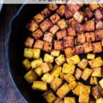 Here's a simple easy recipe for Crispy Tofu that can be made on the stovetop in 20 minutes with just 3 ingredients. You'll find a million uses for this crispy tofu and fun ways to season it - adding it to meals you are already making. #crispytofu #simpletofurecipes #easytofu #tofu #tofurecipes #friedtofu #stirfriedtofu