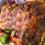 Oven Roasted Turkey Breast with spices, herbs, garlic and lemon zest! Tender juicy meat with crispy flavorful skin, it's a simple alternative to a full-sized turkey, perfect for smaller families!