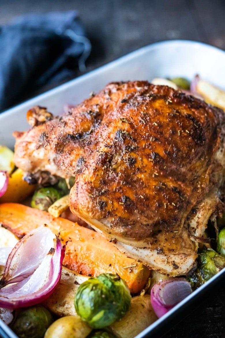 Oven Roasted Turkey Breast with spices, herbs, garlic and lemon zest! Tender juicy meat with crispy flavorful skin, it's a simple alternative to a full-sized turkey, perfect for smaller families!