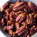 Maple-Roasted Candied Pecans made in just 15 minutes in the Oven. Only 3 ingredients! Oil free, Sugar Free, Vegan and totally foolproof! The BEST recipe that comes out perfect every time! #glazednuts #candiedpecans #maplepecans #pecans