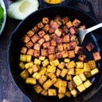 How to make flavorful Crispy Tofu on the stovetop in 20 minutes! You'll find a million uses for this crispy tofu and fun ways to season it - adding it to meals you are already making. #crispytofu #simpletofurecipes #easytofu #tofu #tofurecipes #friedtofu #stirfriedtofu