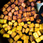 How to make flavorful Crispy Tofu on the stovetop in 20 minutes! You'll find a million uses for this crispy tofu and fun ways to season it - adding it to meals you are already making. #crispytofu #simpletofurecipes #easytofu #tofu #tofurecipes #friedtofu #stirfriedtofu